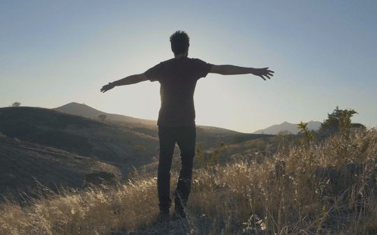 man-enjoying-the-wind